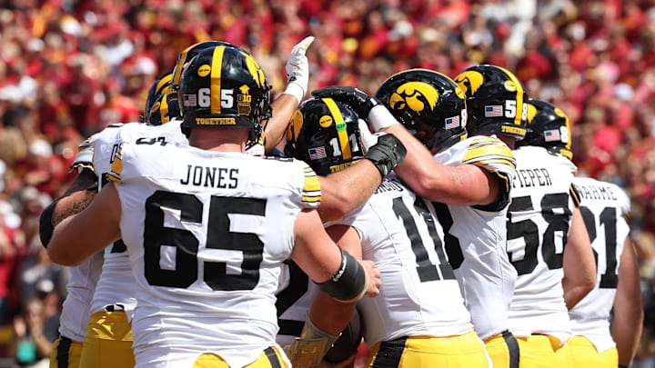 Sep 6, 2025; Ames, Iowa, USA; The Iowa Hawkeyes celebrate after quarterback Mark Gronowski (11) scored a touchdown against the Iowa State Cyclones during the second quarter at Jack Trice Stadium. Mandatory Credit: Reese Strickland-Imagn Images