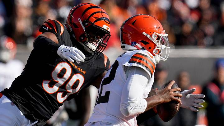 Jan 4, 2026; Cincinnati, Ohio, USA; Cincinnati Bengals defensive end Myles Murphy (99) wraps up Cleveland Browns quarterback Shedeur Sanders (12) in the first quarter at Paycor Stadium. Mandatory Credit: Sam Greene-USA TODAY Network via Imagn Images Jan 4, 2026; Cincinnati, Ohio, USA; Cincinnati Bengals defensive end Myles Murphy (99) wraps up Cleveland Browns quarterback Shedeur Sanders (12) in the first quarter at Paycor Stadium. Mandatory Credit: Sam Greene-USA TODAY Network via Imagn Images