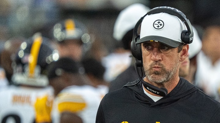 Pittsburgh Steelers quarterback Aaron Rodgers (8) walks along the sideline with a head set during the first half of the first preseason game where the Jacksonville Jaguars hosted the Pittsburgh Steelers Saturday Aug. 9, 2025, at EverBank Stadium in Jacksonville, Fla. [Doug Engle/Florida Times-Union]