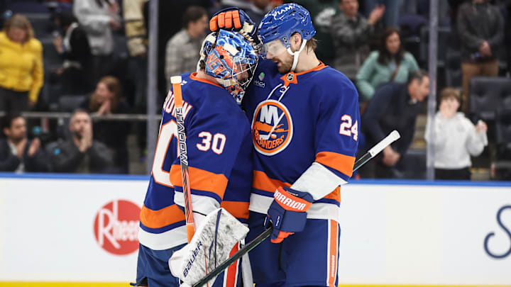 Apr 9, 2026; Elmont, New York, USA; New York Islanders goaltender Ilya Sorokin (30) is greeted by defenseman Scott Mayfield (24) afer defeating the Toronto Maple Leafs at UBS Arena. Mandatory Credit: Wendell Cruz-Imagn Images Apr 9, 2026; Elmont, New York, USA; New York Islanders goaltender Ilya Sorokin (30) is greeted by defenseman Scott Mayfield (24) afer defeating the Toronto Maple Leafs at UBS Arena. Mandatory Credit: Wendell Cruz-Imagn Images