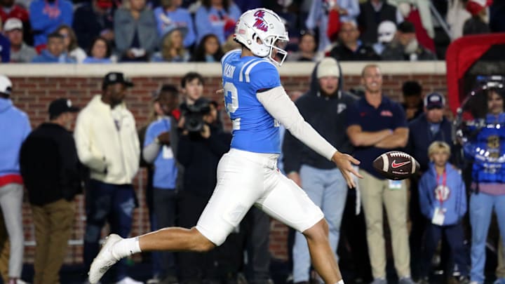 Oct 7, 2023; Oxford, Mississippi, USA; Mississippi Rebels kicker Fraser Masin (12) punts the ball during the second half against the Arkansas Razorbacks at Vaught-Hemingway Stadium. Mandatory Credit: Petre Thomas-Imagn Images Oct 7, 2023; Oxford, Mississippi, USA; Mississippi Rebels kicker Fraser Masin (12) punts the ball during the second half against the Arkansas Razorbacks at Vaught-Hemingway Stadium. Mandatory Credit: Petre Thomas-Imagn Images