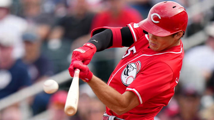 Cincinnati Reds infielder Tyler Callihan hits a two-run home run in the eighth inning during a MLB spring training baseball game, Saturday, Feb. 24, 2024, at Goodyear Ballpark in Goodyear, Ariz.