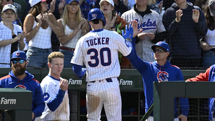 May 31, 2025; Chicago, Illinois, USA;  Chicago Cubs outfielder Kyle Tucker (30) high fives manager Craig Counsell (11) after he scores against the Cincinnati Reds during the eighth inning at Wrigley Field. Mandatory Credit: Matt Marton-Imagn Images