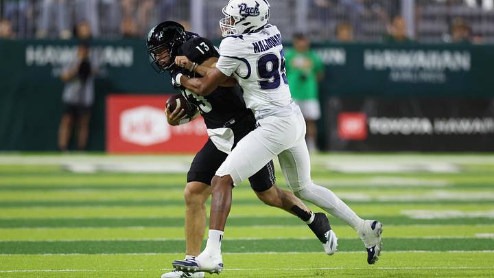 Oct 26, 2024; Honolulu, Hawaii, USA; Nevada Wolf Pack linebacker Jonathan Maldonado (95) shoves Hawaii Rainbow Warriors quarterback Brayden Schager (13) out of bounds during the first quarter of an NCAA college football game at the Clarence T.C. Ching Athletics Complex. Mandatory Credit: Marco Garcia-Imagn Images Oct 26, 2024; Honolulu, Hawaii, USA; Nevada Wolf Pack linebacker Jonathan Maldonado (95) shoves Hawaii Rainbow Warriors quarterback Brayden Schager (13) out of bounds during the first quarter of an NCAA college football game at the Clarence T.C. Ching Athletics Complex. Mandatory Credit: Marco Garcia-Imagn Images