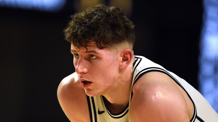 Feb 18, 2023; Nashville, Tennessee, USA; Vanderbilt Commodores forward Liam Robbins (21) waits to shoot free throws against the Auburn Tigers during the second half at Memorial Gymnasium. Mandatory Credit: Christopher Hanewinckel-Imagn Images