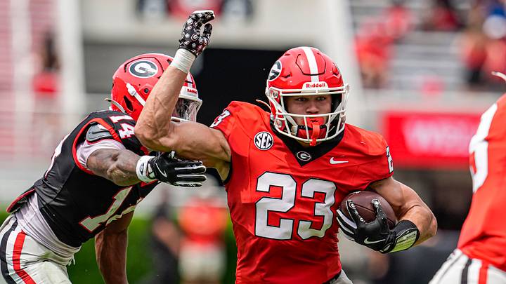 Apr 18, 2026; Athens, GA, USA; Georgia Bulldogs tight end Jaden Reddell (23) runs against defensive back Radeon Dinkins (17) during the Georgia Spring football game at Sanford Stadium. Mandatory Credit: Dale Zanine-Imagn Images Apr 18, 2026; Athens, GA, USA; Georgia Bulldogs tight end Jaden Reddell (23) runs against defensive back Radeon Dinkins (17) during the Georgia Spring football game at Sanford Stadium. Mandatory Credit: Dale Zanine-Imagn Images