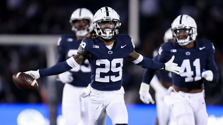 Nov 30, 2024; University Park, Pennsylvania, USA; Penn State Nittany Lions cornerback Audavion Collins (29) celebrates after intercepting the ball against the Maryland Terrapins during the second quarter at Beaver Stadium. Mandatory Credit: Matthew O'Haren-Imagn Images