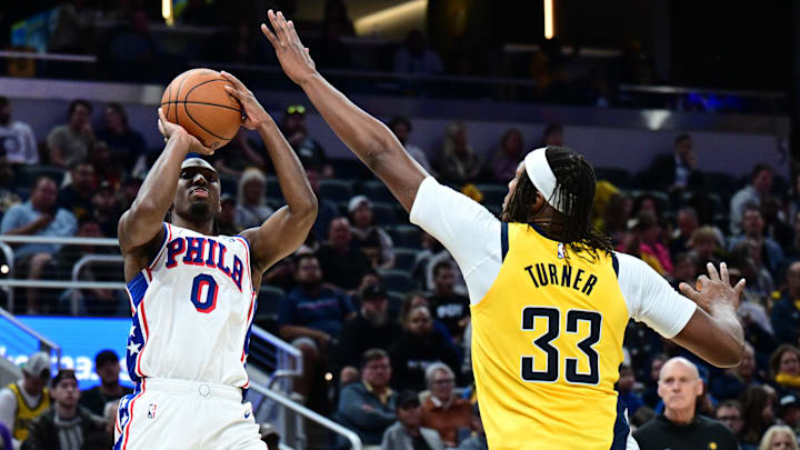 Oct 27, 2024; Indianapolis, Indiana, USA; Philadelphia 76ers guard Tyrese Maxey (0) shoots the ball over Indiana Pacers center Myles Turner (33) during the second half at Gainbridge Fieldhouse. Mandatory Credit: Marc Lebryk-Imagn Images