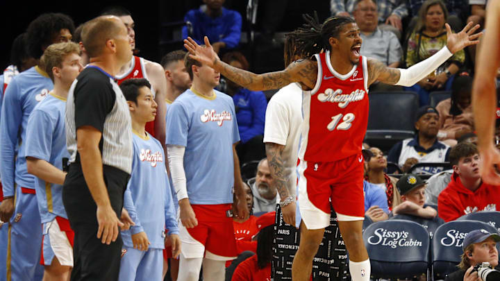 Apr 10, 2025; Memphis, Tennessee, USA; Memphis Grizzlies guard Ja Morant (12) reacts from the bench area during the fourth quarter against the Minnesota Timberwolves at FedExForum. Mandatory Credit: Petre Thomas-Imagn Images