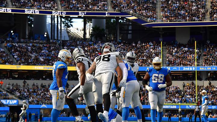 Oct 1, 2023; Inglewood, California, USA; Las Vegas Raiders defensive end Maxx Crosby (98) celebrates after sacking Los Angeles Chargers quarterback Justin Herbert (10) during the second half at SoFi Stadium. Mandatory Credit: Gary A. Vasquez-Imagn Images