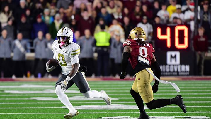 Nov 15, 2025; Chestnut Hill, Massachusetts, USA; Georgia Tech Yellow Jackets running back Malachi Hosley (0) runs the ball while Boston College Eagles defensive back Omar Thornton (0) defends during the second half at Alumni Stadium. Mandatory Credit: Bob DeChiara-Imagn Images Nov 15, 2025; Chestnut Hill, Massachusetts, USA; Georgia Tech Yellow Jackets running back Malachi Hosley (0) runs the ball while Boston College Eagles defensive back Omar Thornton (0) defends during the second half at Alumni Stadium. Mandatory Credit: Bob DeChiara-Imagn Images