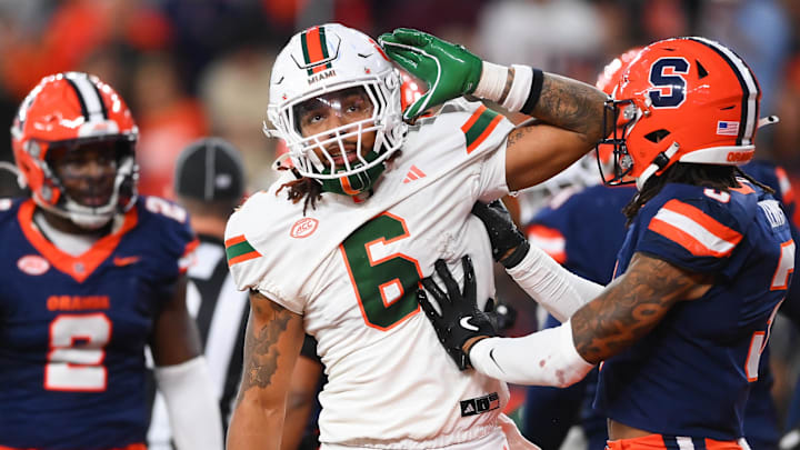 Nov 30, 2024; Syracuse, New York, USA; Miami Hurricanes running back Damien Martinez (6) gestures to fans after running for a touchdown against the Syracuse Orange during the second half at the JMA Wireless Dome. Mandatory Credit: Rich Barnes-Imagn Images Nov 30, 2024; Syracuse, New York, USA; Miami Hurricanes running back Damien Martinez (6) gestures to fans after running for a touchdown against the Syracuse Orange during the second half at the JMA Wireless Dome. Mandatory Credit: Rich Barnes-Imagn Images