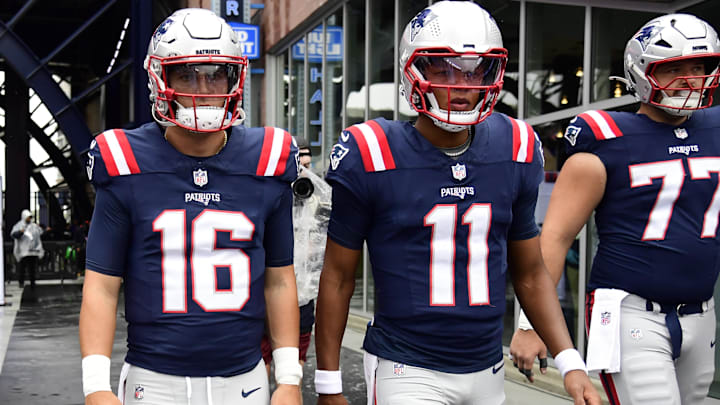 New England Patriots quarterback Tommy DeVito (16) and  quarterback Joshua Dobbs (11) takes the field.