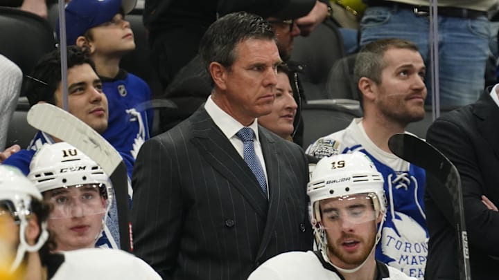 Dec 16, 2023; Toronto, Ontario, CAN; Pittsburgh Penguins head coach Mike Sullivan (middle) looks on from the bench during the second period against the Toronto Maple Leafs at Scotiabank Arena. Mandatory Credit: John E. Sokolowski-Imagn Images