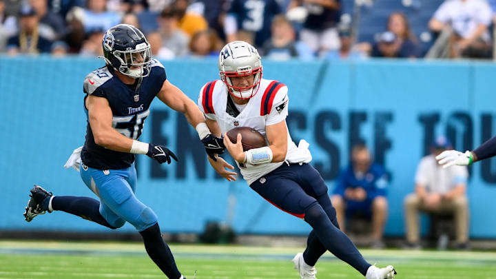 Nov 3, 2024; Nashville, Tennessee, USA;  Tennessee Titans linebacker Jack Gibbens (50) chases down New England Patriots quarterback Drake Maye (10) during the second half at Nissan Stadium. Mandatory Credit: Steve Roberts-Imagn Images