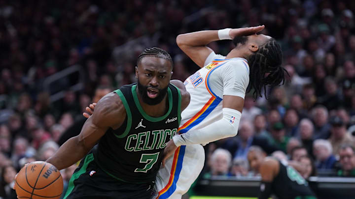 Mar 12, 2025; Boston, Massachusetts, USA; Boston Celtics guard Jaylen Brown (7) drives the ball against Oklahoma City Thunder guard Isaiah Joe (11) in the second quarter at TD Garden. Mandatory Credit: David Butler II-Imagn Images Mar 12, 2025; Boston, Massachusetts, USA; Boston Celtics guard Jaylen Brown (7) drives the ball against Oklahoma City Thunder guard Isaiah Joe (11) in the second quarter at TD Garden. Mandatory Credit: David Butler II-Imagn Images