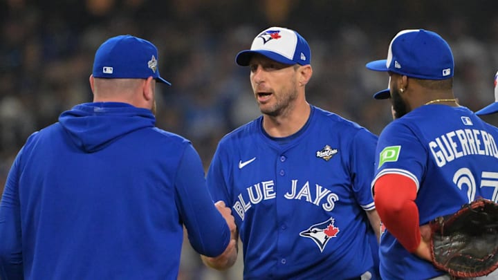 Oct 27, 2025; Los Angeles, California, USA; Toronto Blue Jays manager John Schneider (14) relieves pitcher Max Scherzer (31) in the fifth inning against the Los Angeles Dodgers during game three of the 2025 MLB World Series at Dodger Stadium. Mandatory Credit: Jayne Kamin-Oncea-Imagn Images Oct 27, 2025; Los Angeles, California, USA; Toronto Blue Jays manager John Schneider (14) relieves pitcher Max Scherzer (31) in the fifth inning against the Los Angeles Dodgers during game three of the 2025 MLB World Series at Dodger Stadium. Mandatory Credit: Jayne Kamin-Oncea-Imagn Images