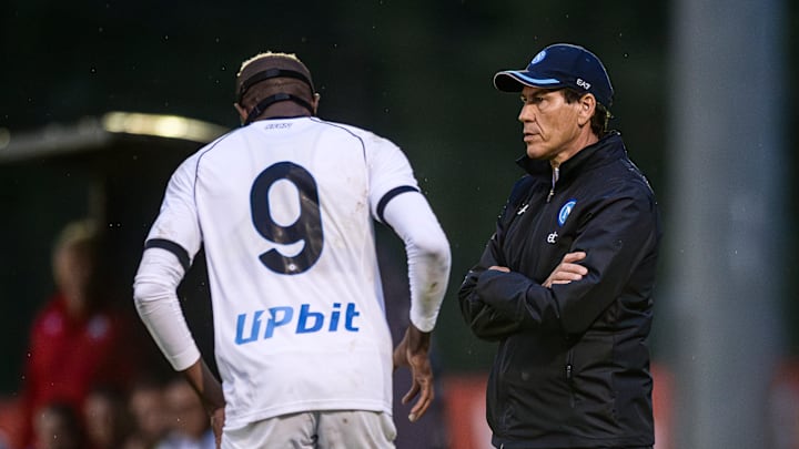 Rudi Garcia (R), head coach of SSC Napoli, and Victor...