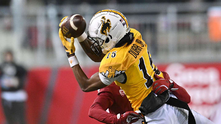 Nov 30, 2024; Pullman, Washington, USA; Wyoming Cowboys wide receiver Chris Durr Jr. makes a sideline catch against Washington State in the second half at Gesa Field at Martin Stadium.