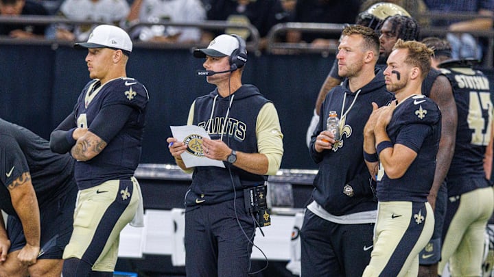 Aug 17, 2025; New Orleans, Louisiana, USA; New Orleans Saints quarterback Spencer Rattler (2) and New Orleans Saints defensive coordinator Brandon Staley looks on against the Jacksonville Jaguars during the first half at Caesars Superdome. Mandatory Credit: Stephen Lew-Imagn Images Aug 17, 2025; New Orleans, Louisiana, USA; New Orleans Saints quarterback Spencer Rattler (2) and New Orleans Saints defensive coordinator Brandon Staley looks on against the Jacksonville Jaguars during the first half at Caesars Superdome. Mandatory Credit: Stephen Lew-Imagn Images