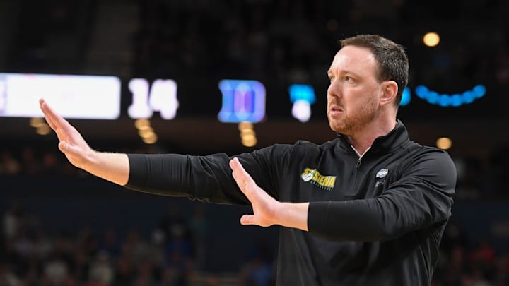 Siena Saints head coach Gerry McNamara calls a play Thursday, March 19, 2026, during the NCAA Men’s Basketball Tournament first round game against the Duke Blue Devils at Bon Secours Wellness Arena in Greenville, South Carolina.