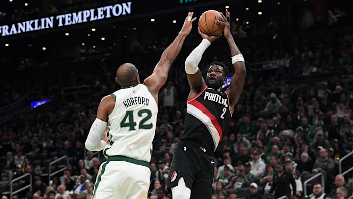 Apr 7, 2024; Boston, Massachusetts, USA; Portland Trail Blazers center Deandre Ayton (2) shoots the ball over Boston Celtics center Al Horford (42) during the first half at TD Garden. Mandatory Credit: Eric Canha-Imagn Images