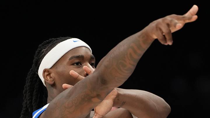 Mar 10, 2026; Charlotte, NC, USA; Southern Methodist University Mustangs guard Jaron Pierre Jr. (5) reacts after making a three point shot in the second half at Spectrum Center. Mandatory Credit: Bob Donnan-Imagn Images