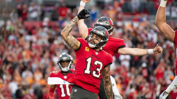 Dec 24, 2023; Tampa, Florida, USA; Tampa Bay Buccaneers wide receiver Mike Evans (13) celebrates the touchdown against the Jacksonville Jaguars in the second quarter at Raymond James Stadium. Mandatory Credit: Jeremy Reper-USA TODAY Sports Dec 24, 2023; Tampa, Florida, USA; Tampa Bay Buccaneers wide receiver Mike Evans (13) celebrates the touchdown against the Jacksonville Jaguars in the second quarter at Raymond James Stadium. Mandatory Credit: Jeremy Reper-USA TODAY Sports