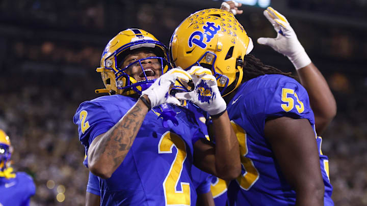 Nov 22, 2025; Atlanta, Georgia, USA; Pittsburgh Panthers wide receiver Kenny Johnson (2) celebrates after a touchdown against the Georgia Tech Yellow Jackets in the first quarter at Bobby Dodd Stadium at Hyundai Field. Mandatory Credit: Brett Davis-Imagn Images