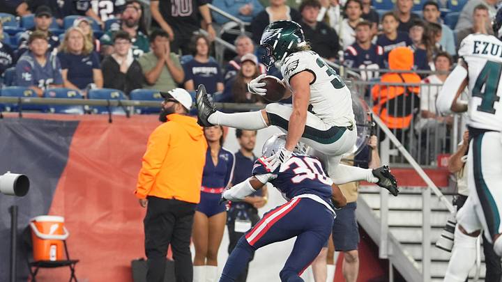 Aug 22, 2026; Foxborough, Massachusetts, USA; Philadelphia Eagles running back Carson Steele (34) leaps over New England Patriots safety Eric Butler (30) and scores a touchdown during the second half at Gillette Stadium. Aug 22, 2026; Foxborough, Massachusetts, USA; Philadelphia Eagles running back Carson Steele (34) leaps over New England Patriots safety Eric Butler (30) and scores a touchdown during the second half at Gillette Stadium.