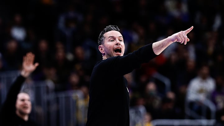 Mar 14, 2025; Denver, Colorado, USA; Los Angeles Lakers head coach JJ Redick gestures in the first quarter against the Denver Nuggets at Ball Arena. Mandatory Credit: Isaiah J. Downing-Imagn Images