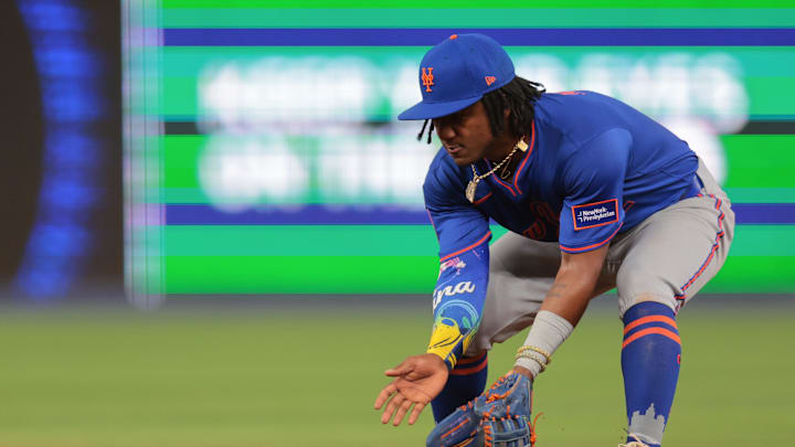 Apr 1, 2025; Miami, Florida, USA; New York Mets shortstop Luisangel Acuna (2) catches a ground ball to retire Miami Marlins shortstop Xavier Edwards (not pictured) during the fifth inning at loanDepot Park. Mandatory Credit: Sam Navarro-Imagn Images
