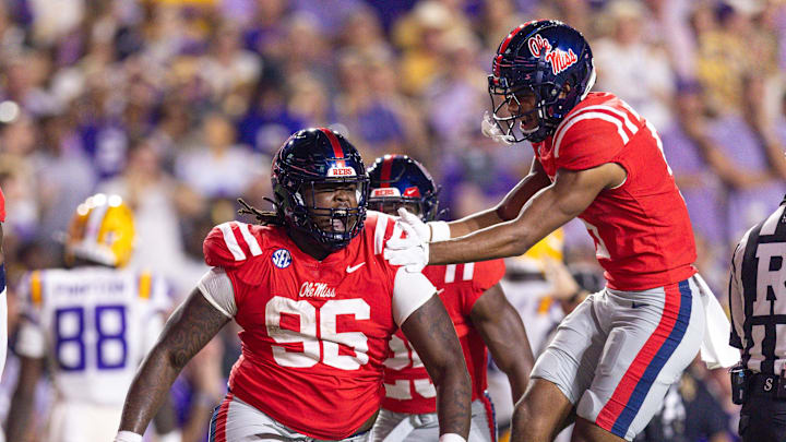 Oct 12, 2024; Baton Rouge, Louisiana, USA;  Mississippi Rebels defensive tackle Jamarious Brown (96) reacts after intercepting a pass against the LSU Tigers during the first half at Tiger Stadium. Mandatory Credit: Stephen Lew-Imagn Images