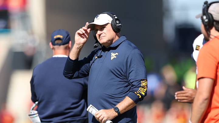 Oct 3, 2026; Ames, Iowa, USA; West Virginia Mountaineers head coach Rich Rodriguez watches his team play the Iowa State Cyclones during the second half at Jack Trice Stadium. Oct 3, 2026; Ames, Iowa, USA; West Virginia Mountaineers head coach Rich Rodriguez watches his team play the Iowa State Cyclones during the second half at Jack Trice Stadium.