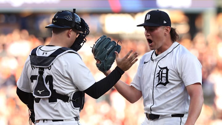 Detroit Tigers Jake Rogers, Tyler Holton embrace after winning Divisional Series Game 3 against the Cleveland Guardians.
