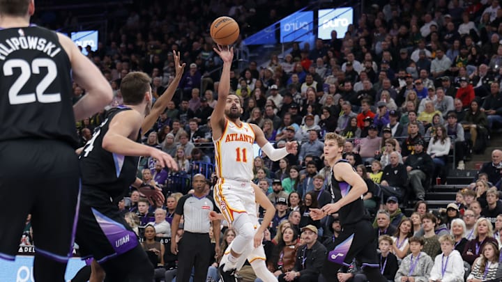Jan 7, 2025; Salt Lake City, Utah, USA;  Atlanta Hawks guard Trae Young (11) shoots the ball during the second quarter against the Utah Jazz at Delta Center. Mandatory Credit: Chris Nicoll-Imagn Images