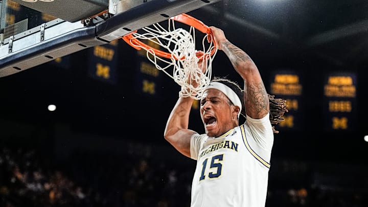 Michigan guard Rubin Jones (15) celebrates a dunk against Purdue during the first half at Crisler Center in Ann Arbor on Tuesday, Feb. 11, 2025.