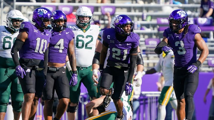Oct 18, 2025; Fort Worth, Texas, USA; TCU Horned Frogs safety Bud Clark (21) reacts after sacking Baylor Bears quarterback Sawyer Robertson (13) during the second half of a game at Amon G. Carter Stadium. Mandatory Credit: Raymond Carlin III-Imagn Images