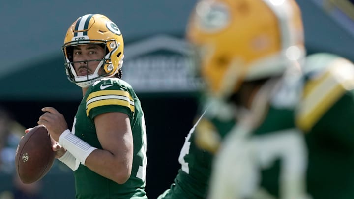 Green Bay Packers quarterback Jordan Love (10) throws a pass to Green Bay Packers wide receiver Romeo Doubs last season.