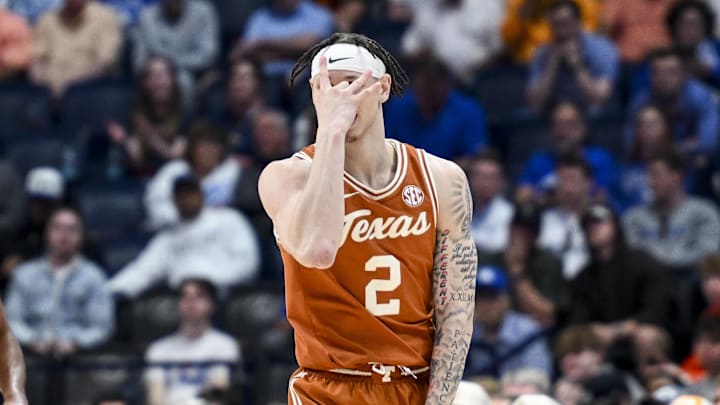 Texas Longhorns guard Chendall Weaver (2) reacts after a made three point basket against the Tennessee Volunteers during the second half at Bridgestone Arena. Texas Longhorns guard Chendall Weaver (2) reacts after a made three point basket against the Tennessee Volunteers during the second half at Bridgestone Arena.