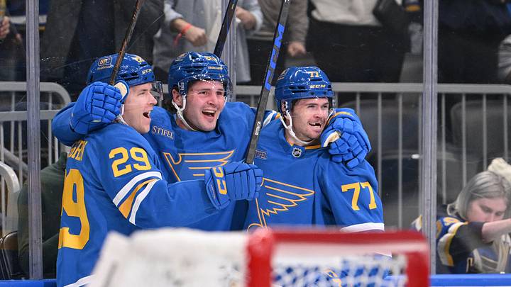Oct 22, 2026; St. Louis, Missouri, USA; St. Louis Blues center Mason McTavish (83) reacts with right wing Jonatan Berggren (29) and left wing Connor McMichael (77) after scoring against the Vegas Golden Knights during the second period at Enterprise Center. Mandatory Credit: Jeff Le-Imagn Images Oct 22, 2026; St. Louis, Missouri, USA; St. Louis Blues center Mason McTavish (83) reacts with right wing Jonatan Berggren (29) and left wing Connor McMichael (77) after scoring against the Vegas Golden Knights during the second period at Enterprise Center. Mandatory Credit: Jeff Le-Imagn Images