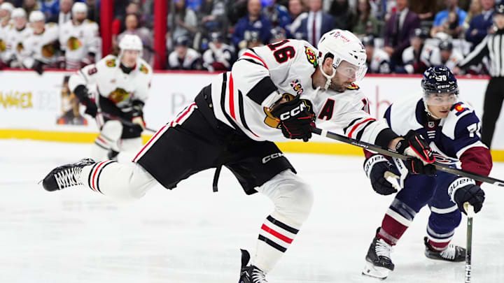 Feb 28, 2026; Denver, Colorado, USA; Chicago Blackhawks center Jason Dickinson (16) takes a shot on the net of the Colorado Avalanche during the first period at Ball Arena. Mandatory Credit: Ron Chenoy-Imagn Images Feb 28, 2026; Denver, Colorado, USA; Chicago Blackhawks center Jason Dickinson (16) takes a shot on the net of the Colorado Avalanche during the first period at Ball Arena. Mandatory Credit: Ron Chenoy-Imagn Images