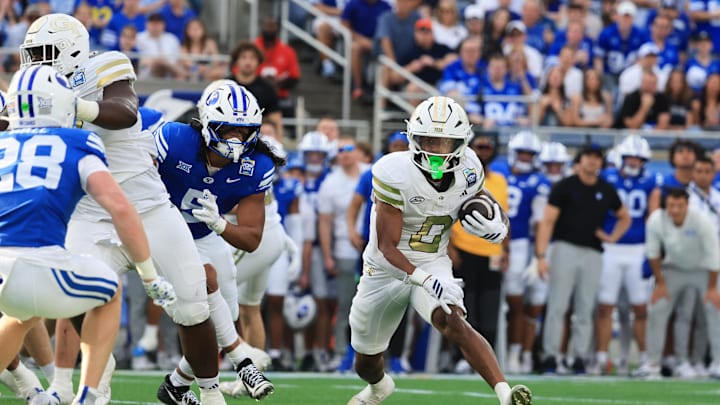 Dec 27, 2025; Orlando, FL, USA; Georgia Tech Yellow Jackets running back Malachi Hosley (0) runs with the ball against the BYU Cougars during the first half at Camping World Stadium. Mandatory Credit: Kim Klement Neitzel-Imagn Images Dec 27, 2025; Orlando, FL, USA; Georgia Tech Yellow Jackets running back Malachi Hosley (0) runs with the ball against the BYU Cougars during the first half at Camping World Stadium. Mandatory Credit: Kim Klement Neitzel-Imagn Images