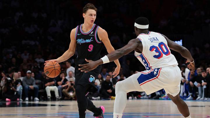 Mar 30, 2026; Miami, Florida, USA; Miami Heat guard Pelle Larsson (9) dribbles the basketball as Philadelphia 76ers center Adem Bona (30) defends during the second quarter at Kaseya Center. Mandatory Credit: Sam Navarro-Imagn Images Mar 30, 2026; Miami, Florida, USA; Miami Heat guard Pelle Larsson (9) dribbles the basketball as Philadelphia 76ers center Adem Bona (30) defends during the second quarter at Kaseya Center. Mandatory Credit: Sam Navarro-Imagn Images