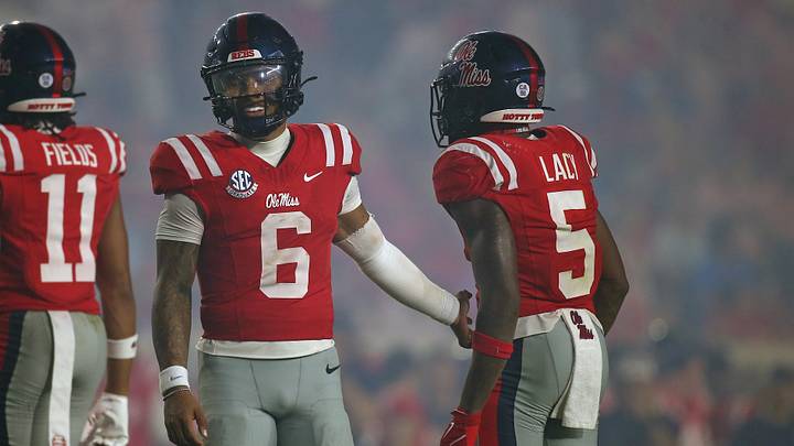 Mississippi Rebels quarterback Trinidad Chambliss reacts with running back Kewan Lacy during the fourth quarter against the Charlotte 49ers at Vaught-Hemingway Stadium. Mandatory Credit: Petre Thomas-Imagn Images Mississippi Rebels quarterback Trinidad Chambliss reacts with running back Kewan Lacy during the fourth quarter against the Charlotte 49ers at Vaught-Hemingway Stadium. Mandatory Credit: Petre Thomas-Imagn Images