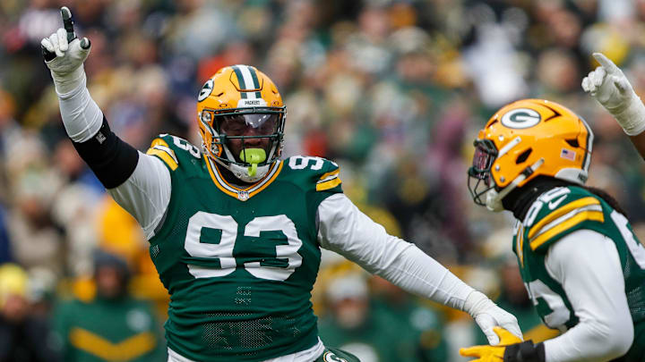 Green Bay Packers defensive tackle T.J. Slaton (93) celebrates with defensive end Rashan Gary (52) after Gary tallies a sack against the Chicago Bears on Sunday, January 5, 2025, at Lambeau Field in Green Bay, Wis. 
Tork Mason/USA TODAY NETWORK-Wisconsin