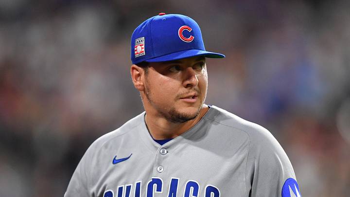 Brad Keller of Chicago Cubs walks off field