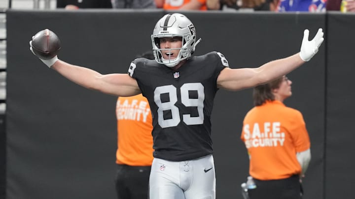 Dec 7, 2025; Paradise, Nevada, USA;  Las Vegas Raiders tight end Brock Bowers (89) reacts after catching a touchdown against the Denver Broncos during the first half at Allegiant Stadium. Mandatory Credit: Kirby Lee-Imagn Images