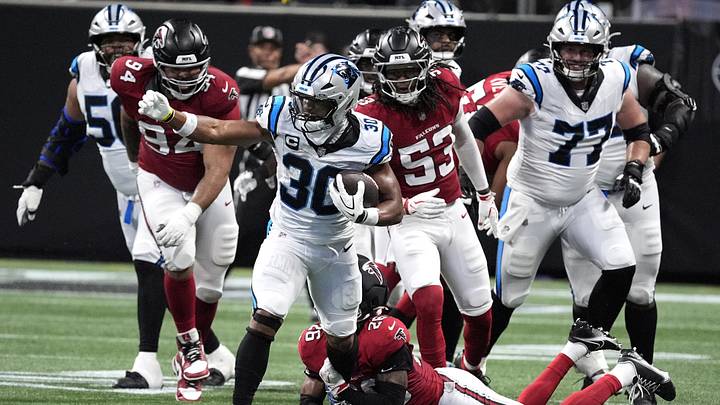 Sep 20, 2026; Atlanta, Georgia, USA; Carolina Panthers running back Chuba Hubbard (30) rushes and breaks a tackle from Atlanta Falcons cornerback C.J. Henderson (26) during the fourth quarter at Mercedes-Benz Stadium. Mandatory Credit: Dale Zanine-Imagn Images Sep 20, 2026; Atlanta, Georgia, USA; Carolina Panthers running back Chuba Hubbard (30) rushes and breaks a tackle from Atlanta Falcons cornerback C.J. Henderson (26) during the fourth quarter at Mercedes-Benz Stadium. Mandatory Credit: Dale Zanine-Imagn Images