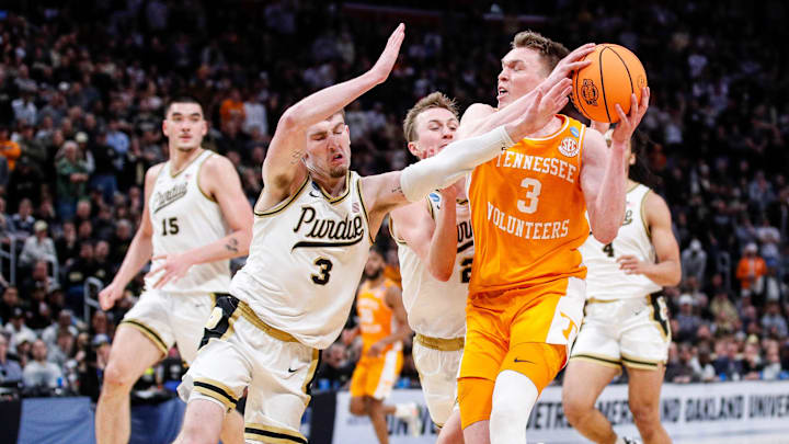 Tennessee guard Dalton Knecht (3) makes a layup against Purdue guard Braden Smith (3) during the